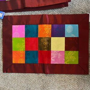 (new w/ tags) Satin color block placemats (6) with burgundy border